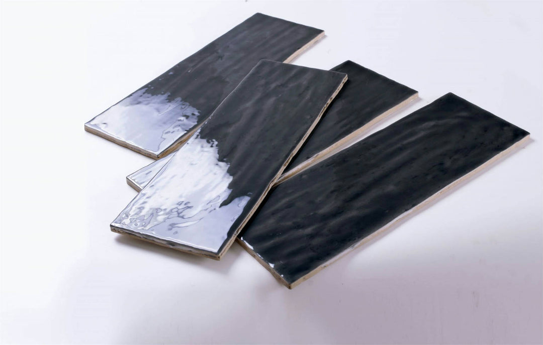A deep graphite hue and a polished finish define Madrid Grafito 5x14 glossy ceramic, adding a contemporary edge.