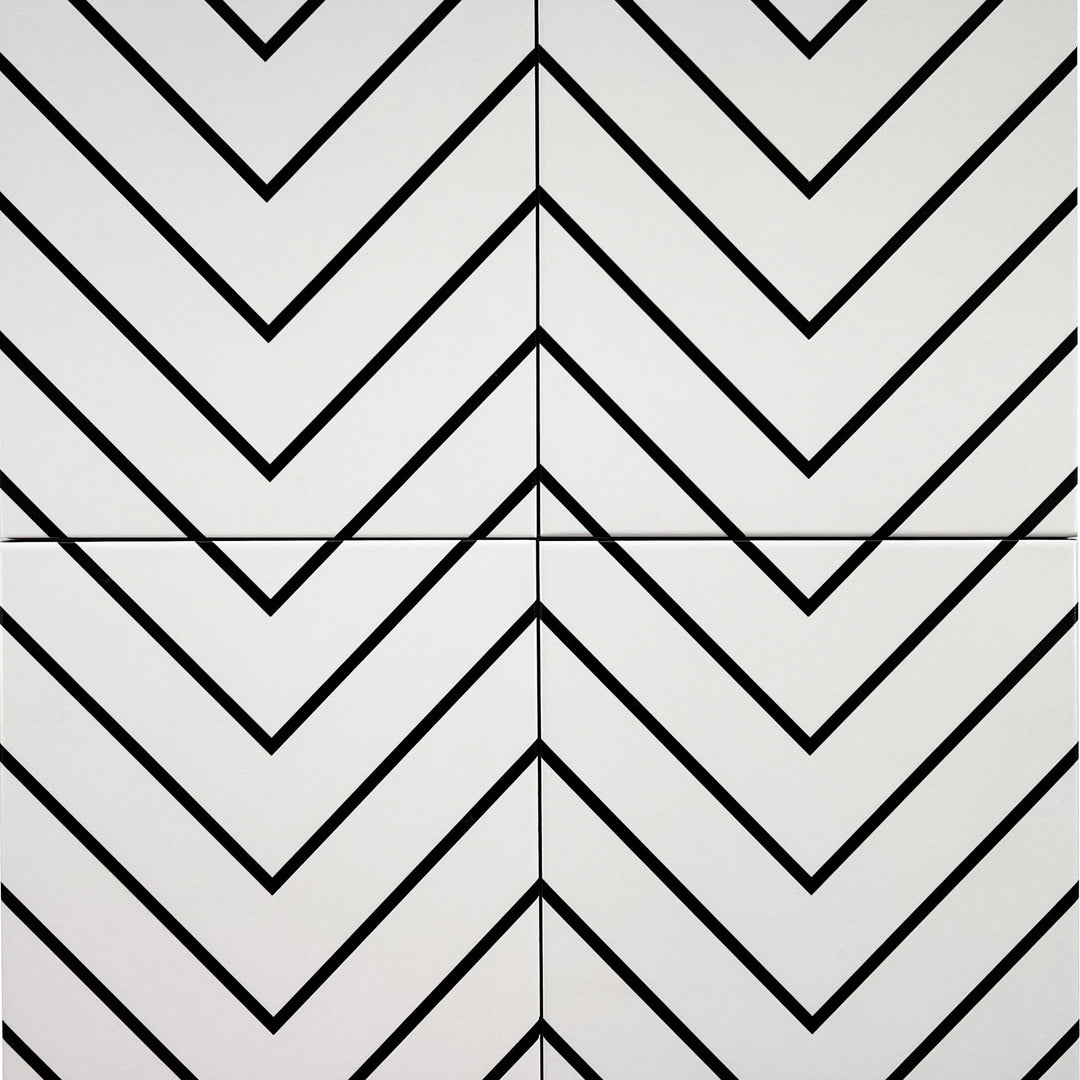Flat perspective showcasing the white with black studio tile, sized 8x8, with a matte surface that enhances its warm hue.