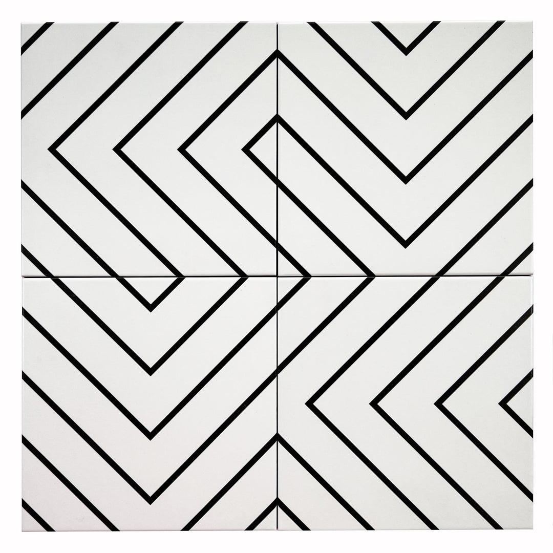 A modern setting with Studio White With Black 8x8 matte porcelain tiles, creating a striking monochrome contrast in a real-life design.