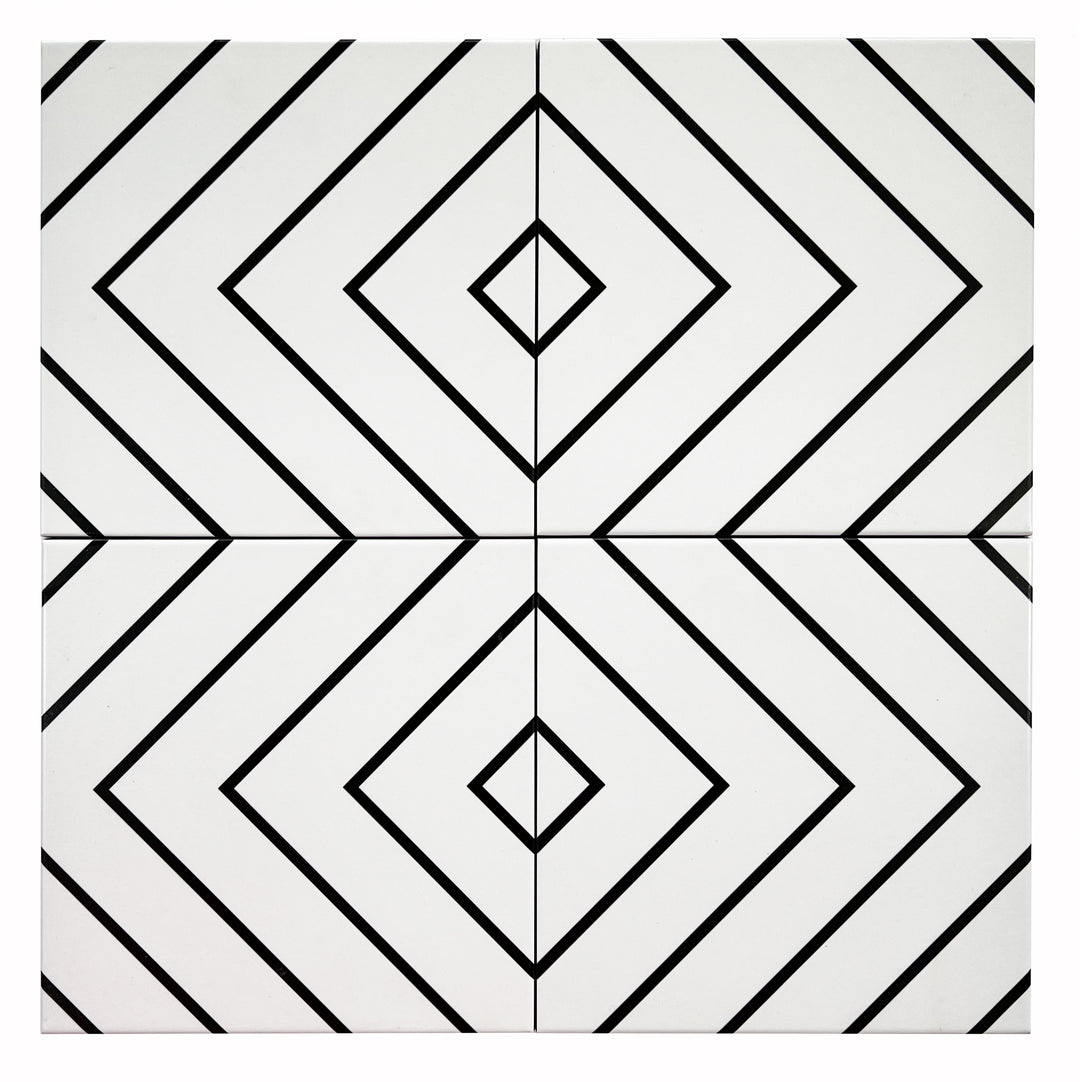 A top-down view of Studio White With Black 8x8 matte porcelain tiles, showcasing their crisp white base with bold black accents in a geometric pattern.