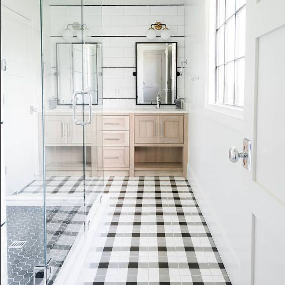 Make a playful statement with Studio Plaid White & Black 8X8 matte porcelain tile, blending classic patterns with contemporary style.