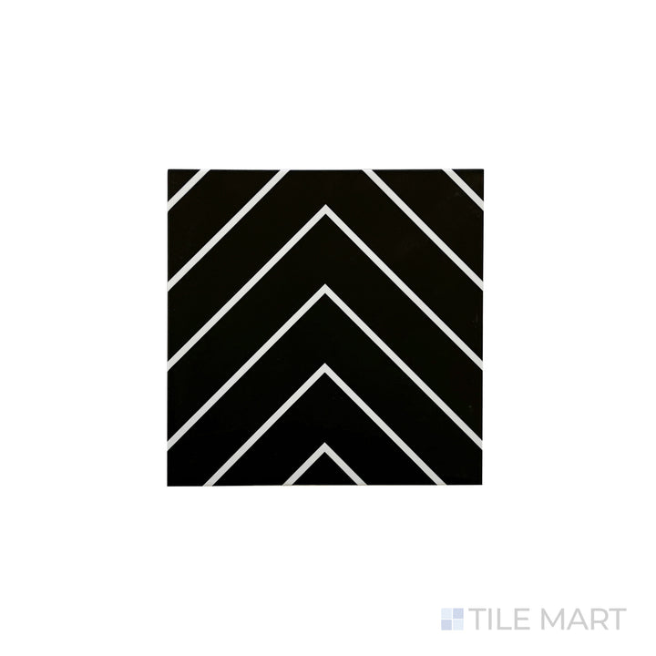 An angled look at the black with white studio tile, highlighting its smooth glaze and the boldness of its soft undertone.