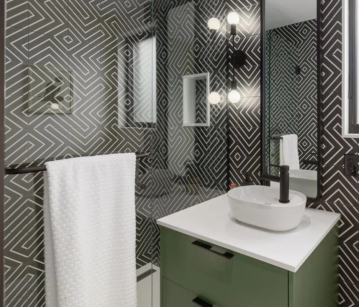 Studio Black with White 8X8 matte porcelain tile delivers dramatic contrast, ideal for chic, monochrome interiors.