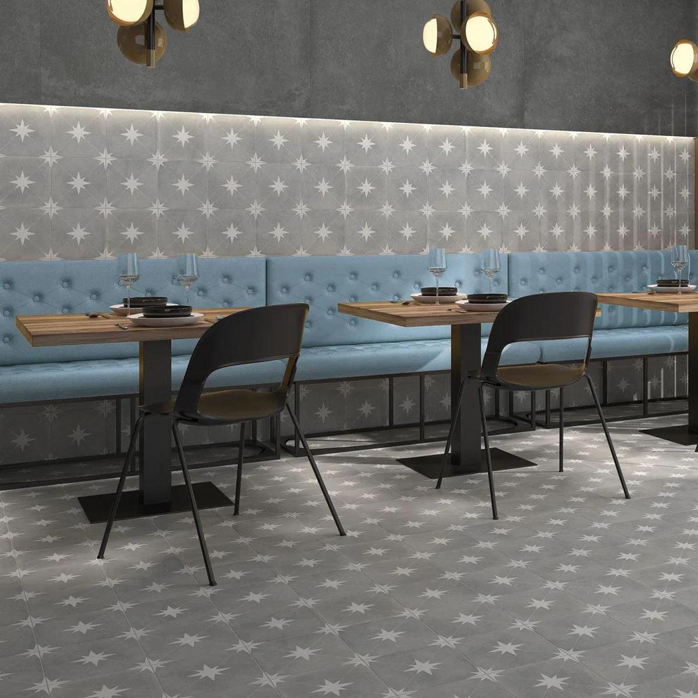 A modern space, featuring ponent grey starburst tile with a matte texture, enhancing the overall ambiance.