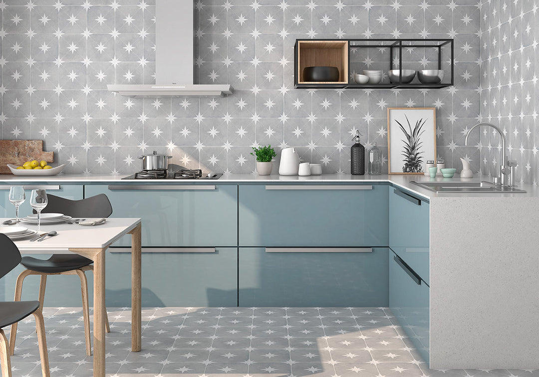 A muted gray surface with a matte texture provides a modern, understated look that integrates seamlessly with Starburst Ponent Grey 9x9 matte porcelain.