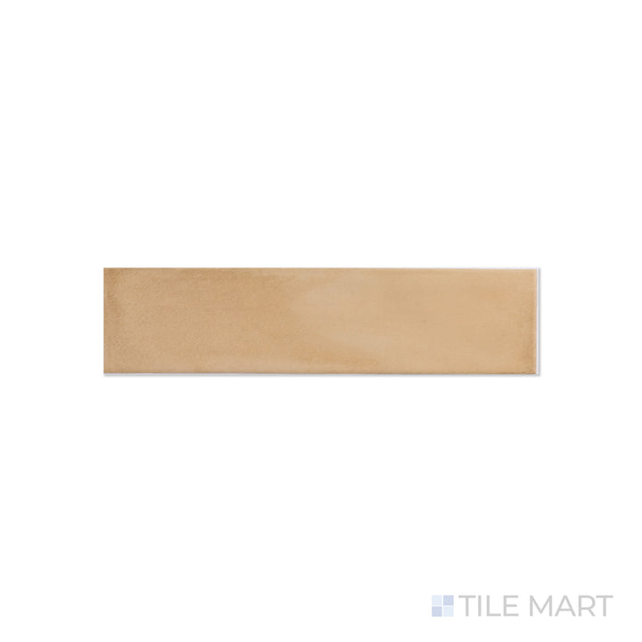 An angled look at the rectangle sand clay tile, highlighting its glossy finish and the boldness of its deep shade.