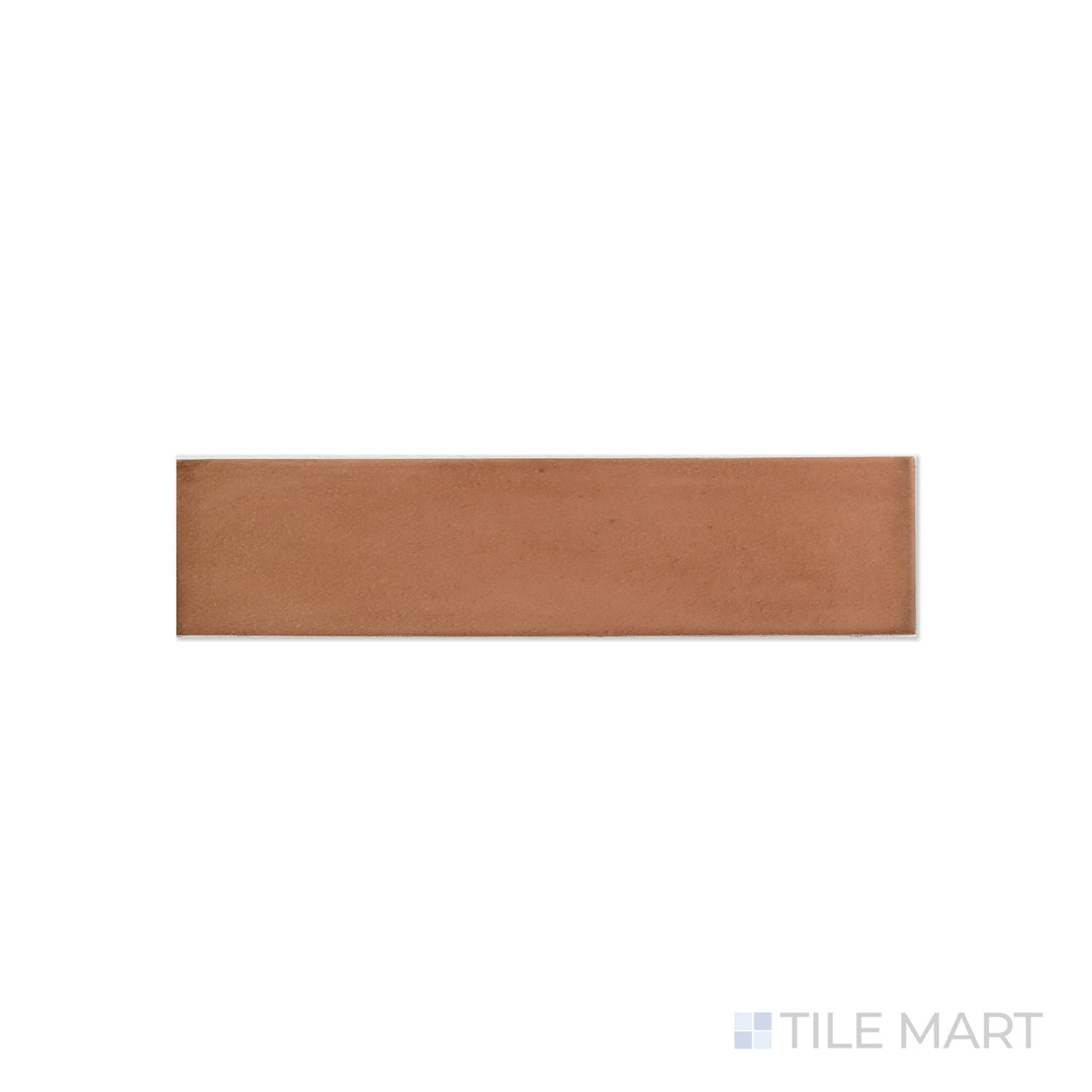 An angled look at the rectangle brick clay tile, highlighting its smooth glaze and the boldness of its soft undertone.
