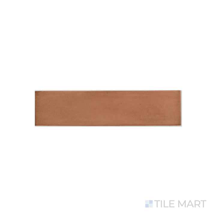 An angled look at the rectangle brick clay tile, highlighting its smooth glaze and the boldness of its soft undertone.