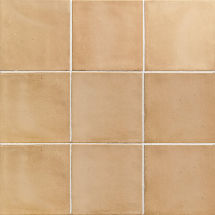 Flat perspective showcasing the square sand clay tile, sized 5x5, with a reflective sheen that enhances its soft undertone.