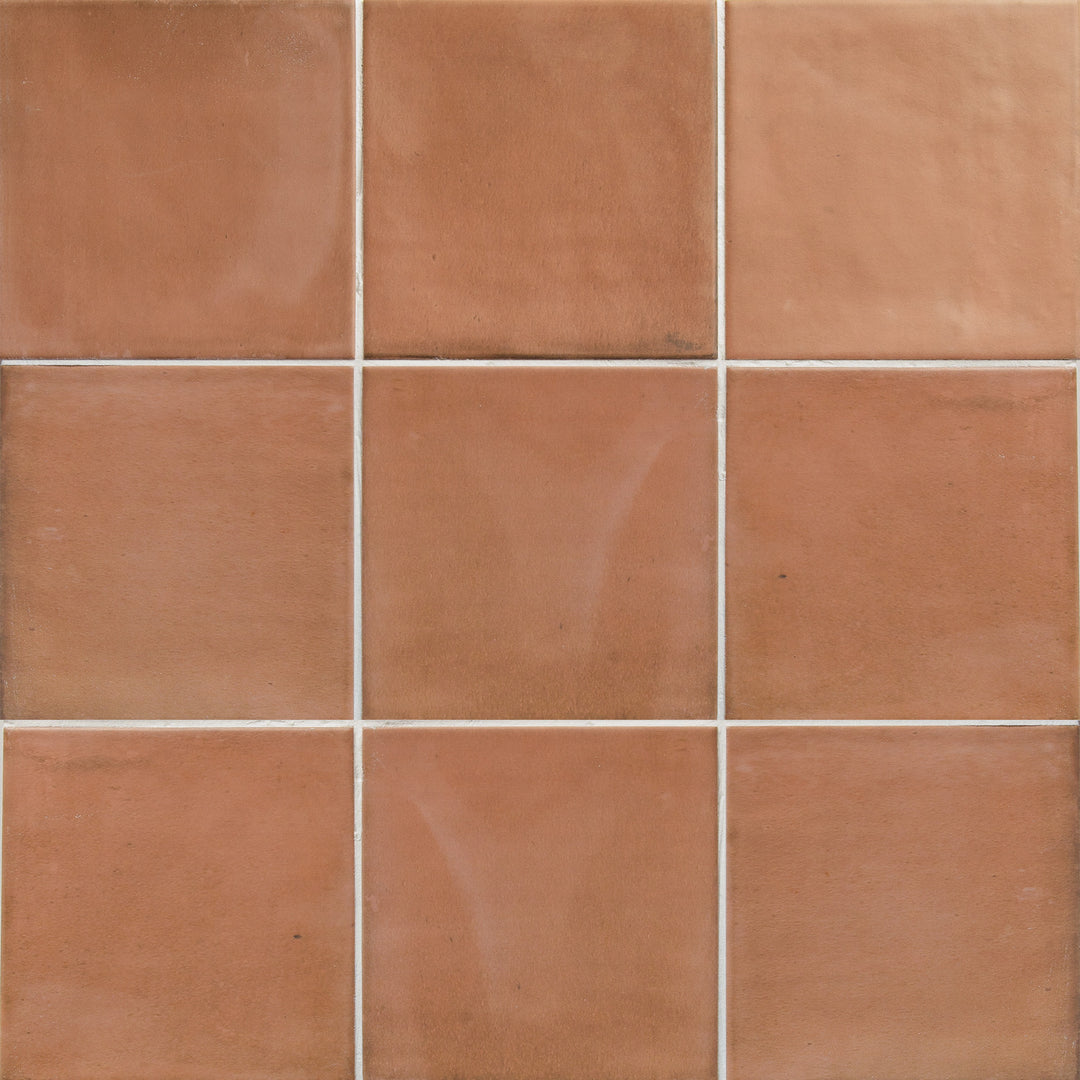 Flat perspective showcasing the square brick clay tile, sized 5x5, with a reflective sheen that enhances its deep shade.