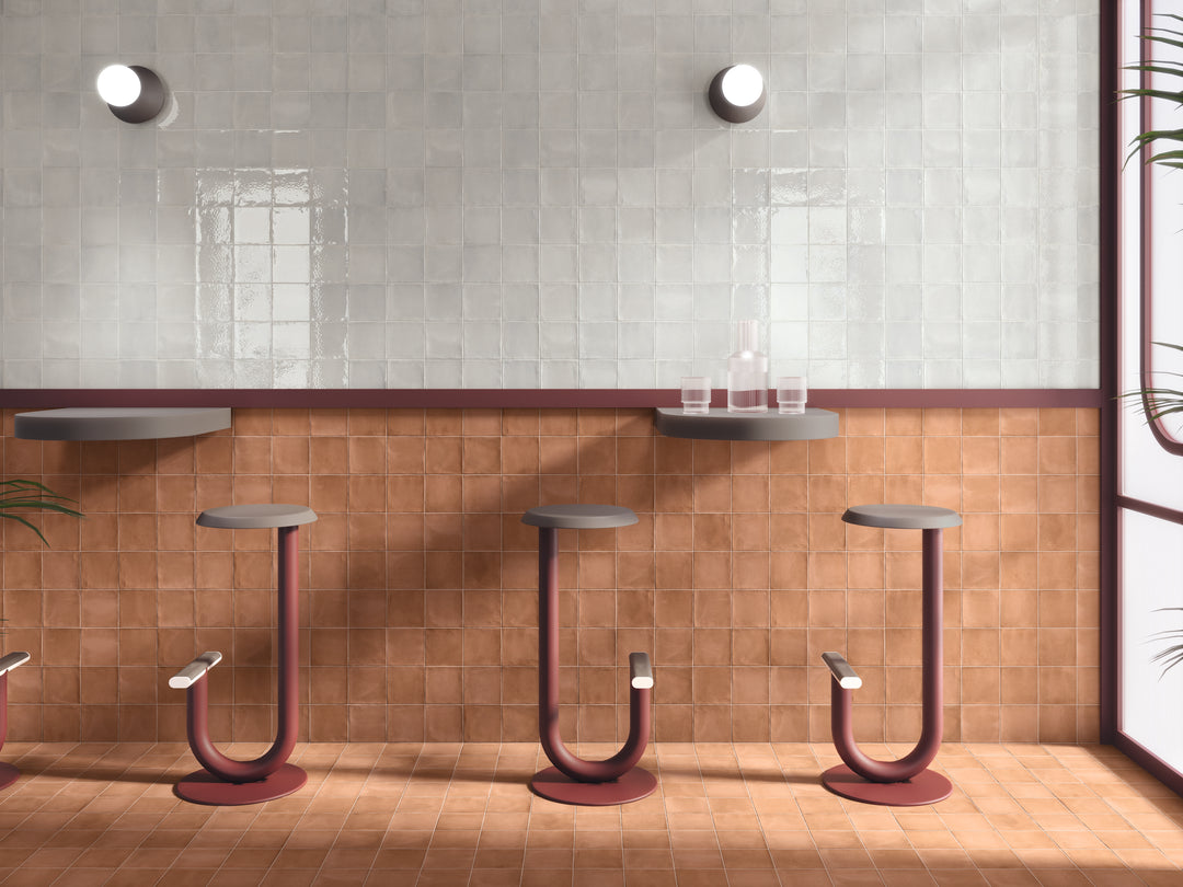 A neutral brick-inspired matte surface adds rustic charm, offering a timeless aesthetic with Clay Brick 5x5 matte porcelain.