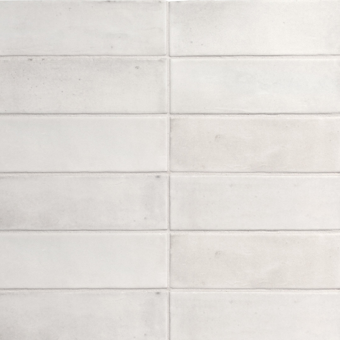 Top angle showcasing the white soco tile, sized 2x6, with a matte surface that enhances its vivid tint.