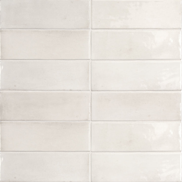 Bird's eye view showcasing the white soco tile, sized 2x6, with a glossy finish that enhances its deep shade.