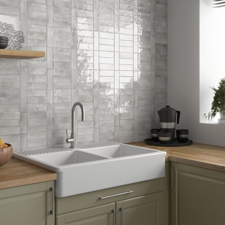 A lifestyle setting, featuring grey soco tile with a glossy texture, bringing a sleek look to the room.