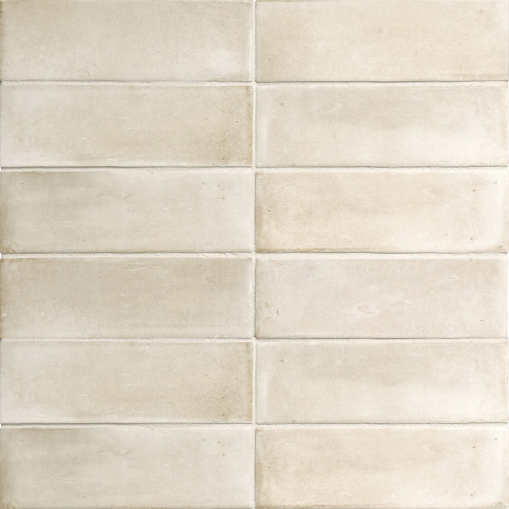 Aerial shot showcasing the beige soco tile, sized 2x6, with a smooth glaze that enhances its warm hue.