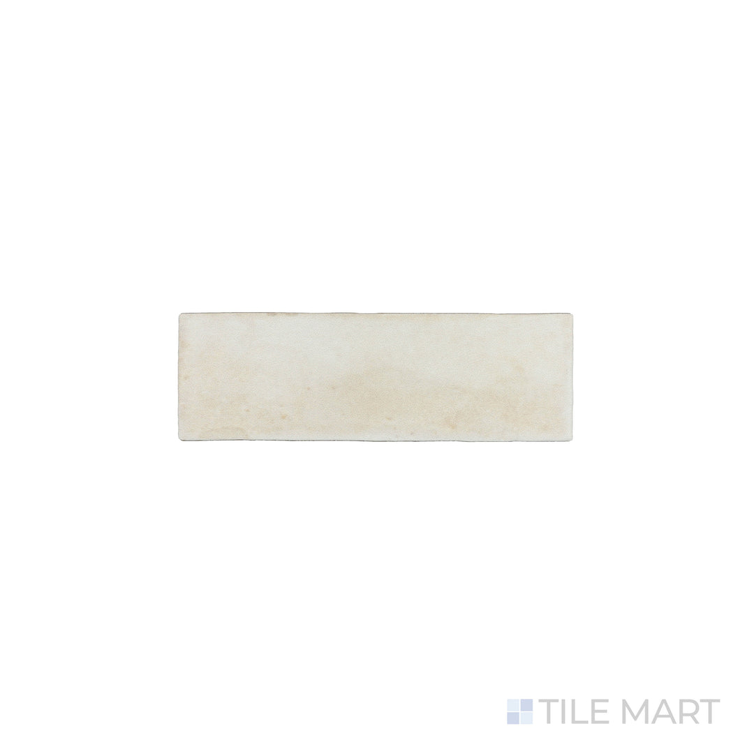 An angled look at the beige soco tile, highlighting its glossy finish and the boldness of its vivid tint.