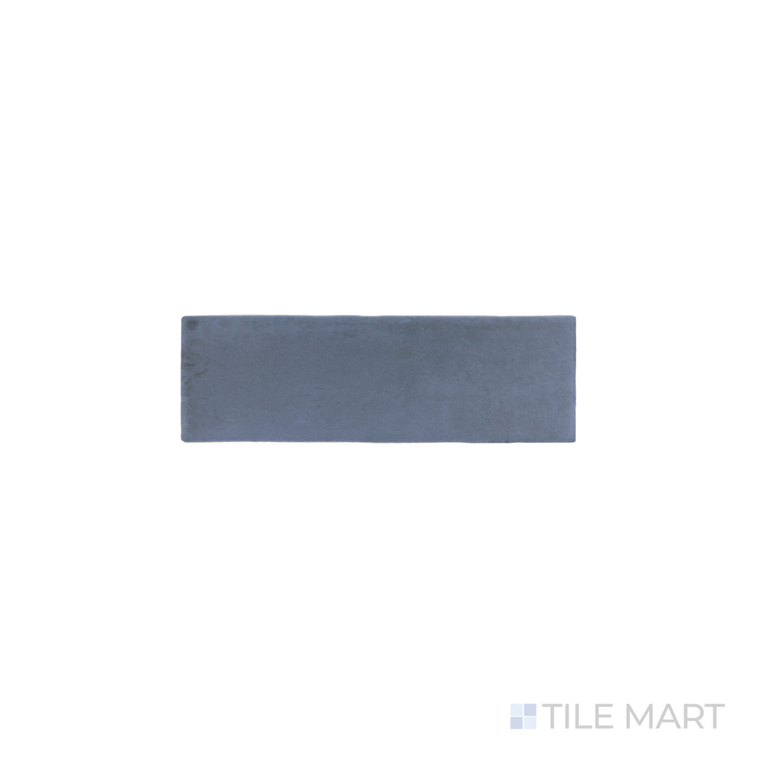 An angled look at the blue soco tile, highlighting its reflective sheen and the boldness of its vivid tint.