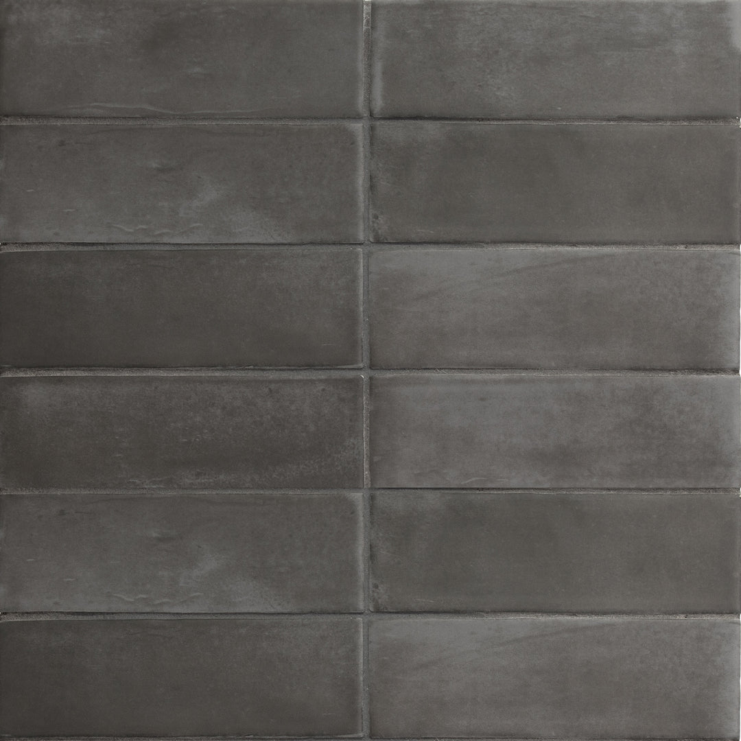 Bird's eye view showcasing the black soco tile, sized 2x6, with a smooth glaze that enhances its warm hue.