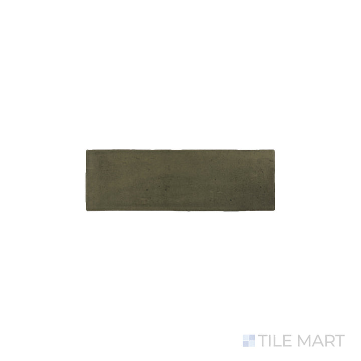 An angled look at the green soco tile, highlighting its textured coating and the boldness of its deep shade.