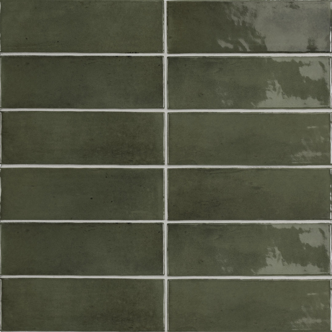 Top angle showcasing the green soco tile, sized 2x6, with a reflective sheen that enhances its soft undertone.
