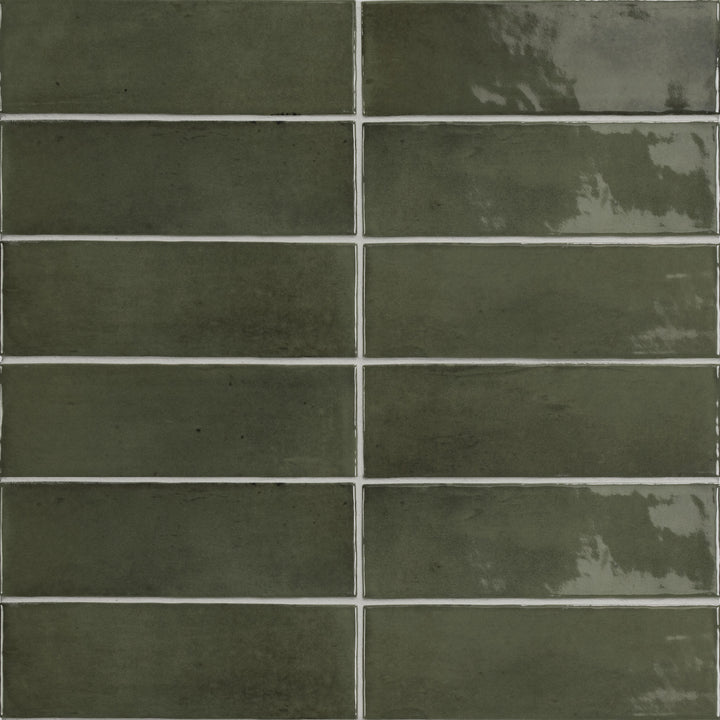 Top angle showcasing the green soco tile, sized 2x6, with a reflective sheen that enhances its soft undertone.