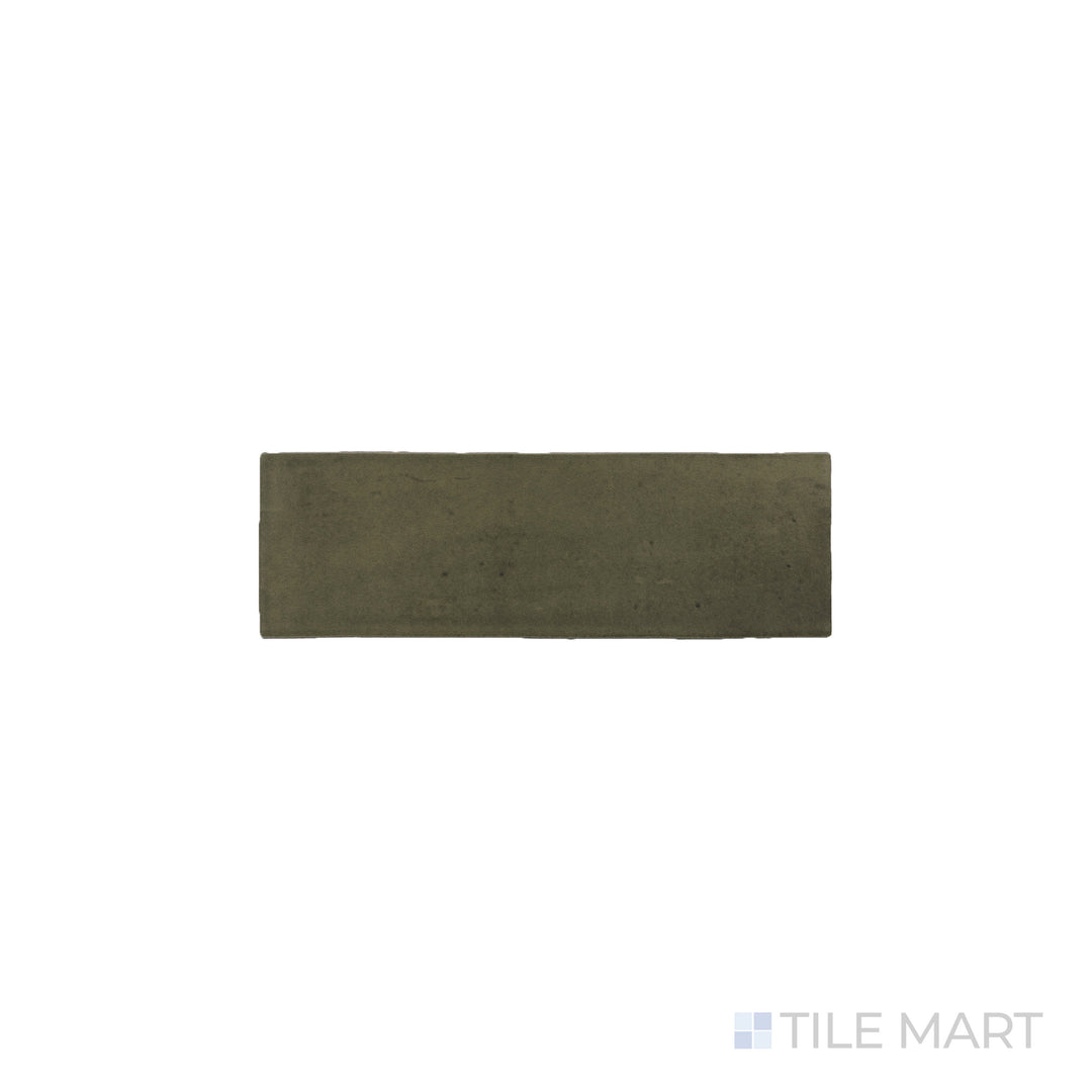 An angled look at the green soco tile, highlighting its matte surface and the boldness of its rich pigment.