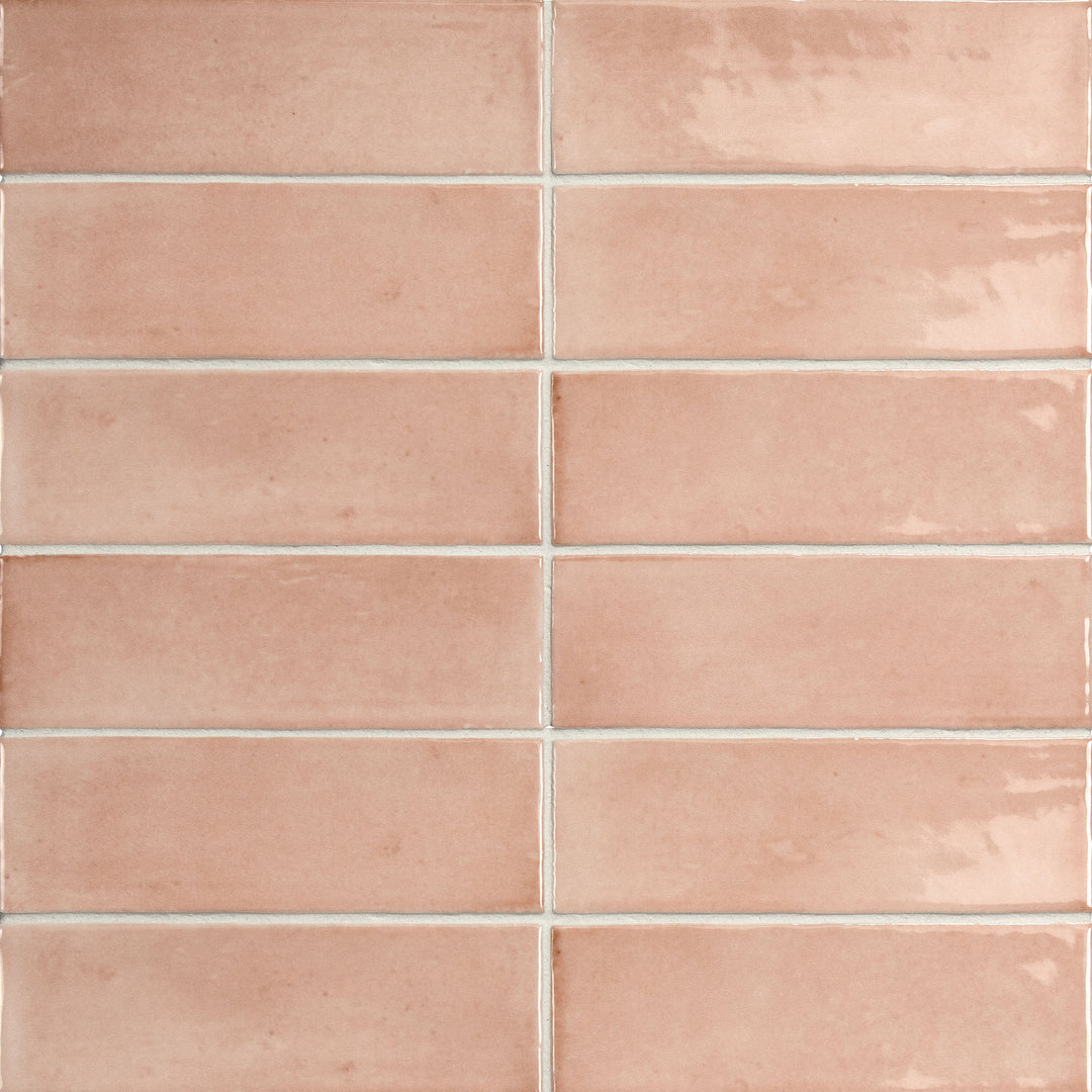 Bird's eye view showcasing the pink soco tile, sized 2x6, with a smooth glaze that enhances its rich pigment.