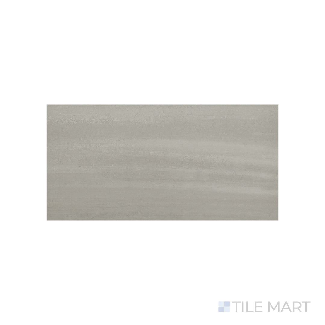 An angled look at the gray flow tile, highlighting its glossy finish and the boldness of its deep shade.