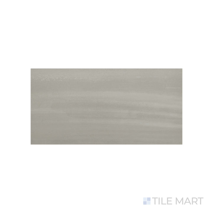 An angled look at the gray flow tile, highlighting its glossy finish and the boldness of its deep shade.