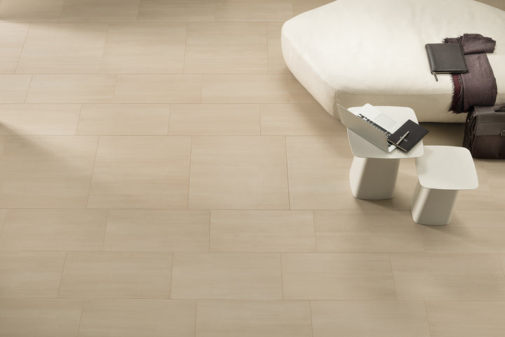 Neutral beige tones and a matte texture make Flow Beige 12x24 porcelain tile a versatile and natural-looking choice.