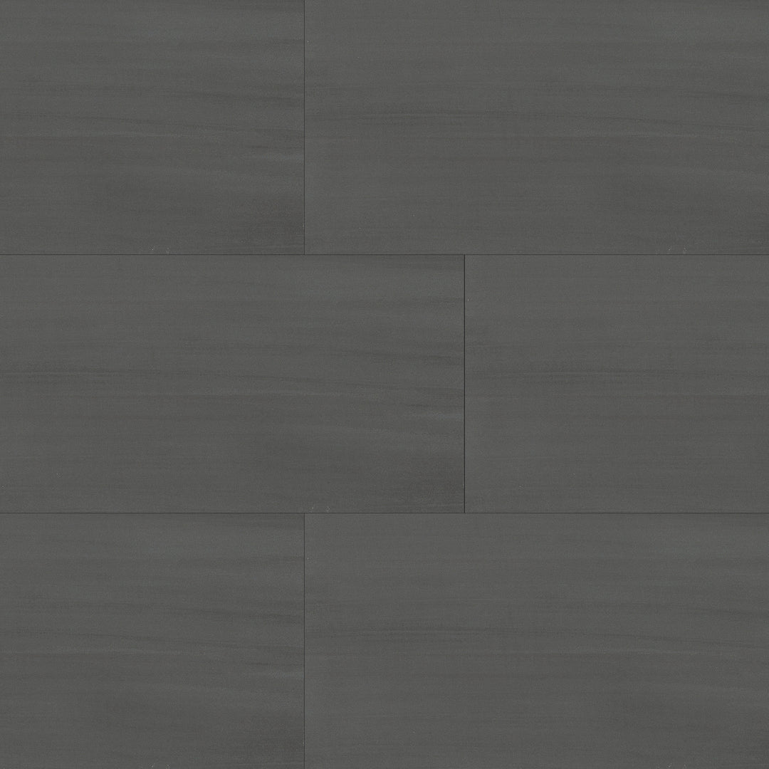 Bird's eye view showcasing the dark gray flow tile, sized 11.75x23.5, with a smooth glaze that enhances its rich pigment.