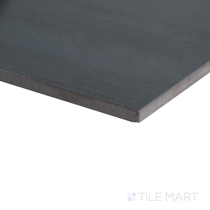 Crisp corner of the 11.75x23.5 flow tile, made from durable stone.