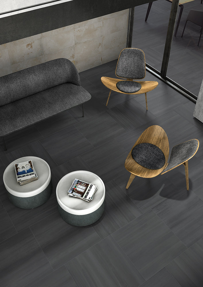 Flow Dark Gray 12X24 matte porcelain tile brings an industrial-inspired elegance, balancing modern and timeless appeal.