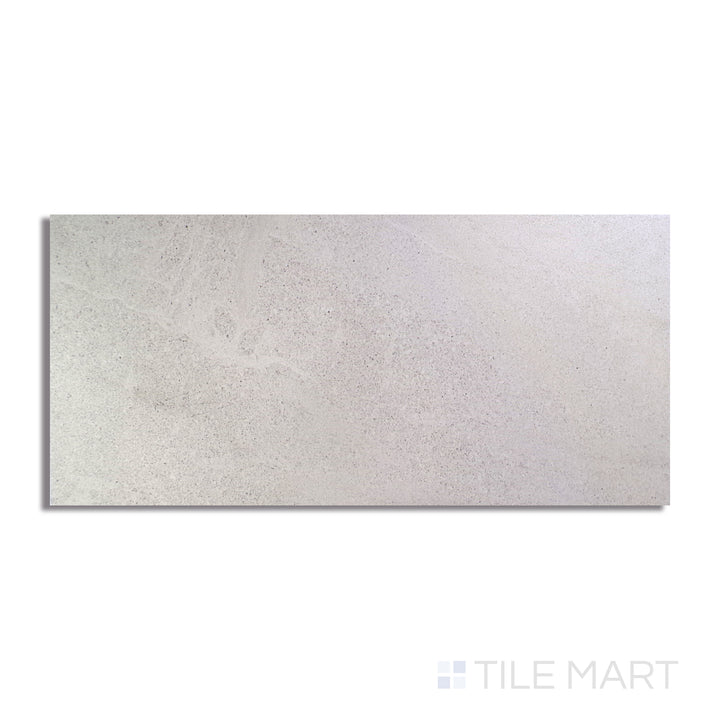 An angled look at the white boston tile, highlighting its glossy finish and the boldness of its soft undertone.