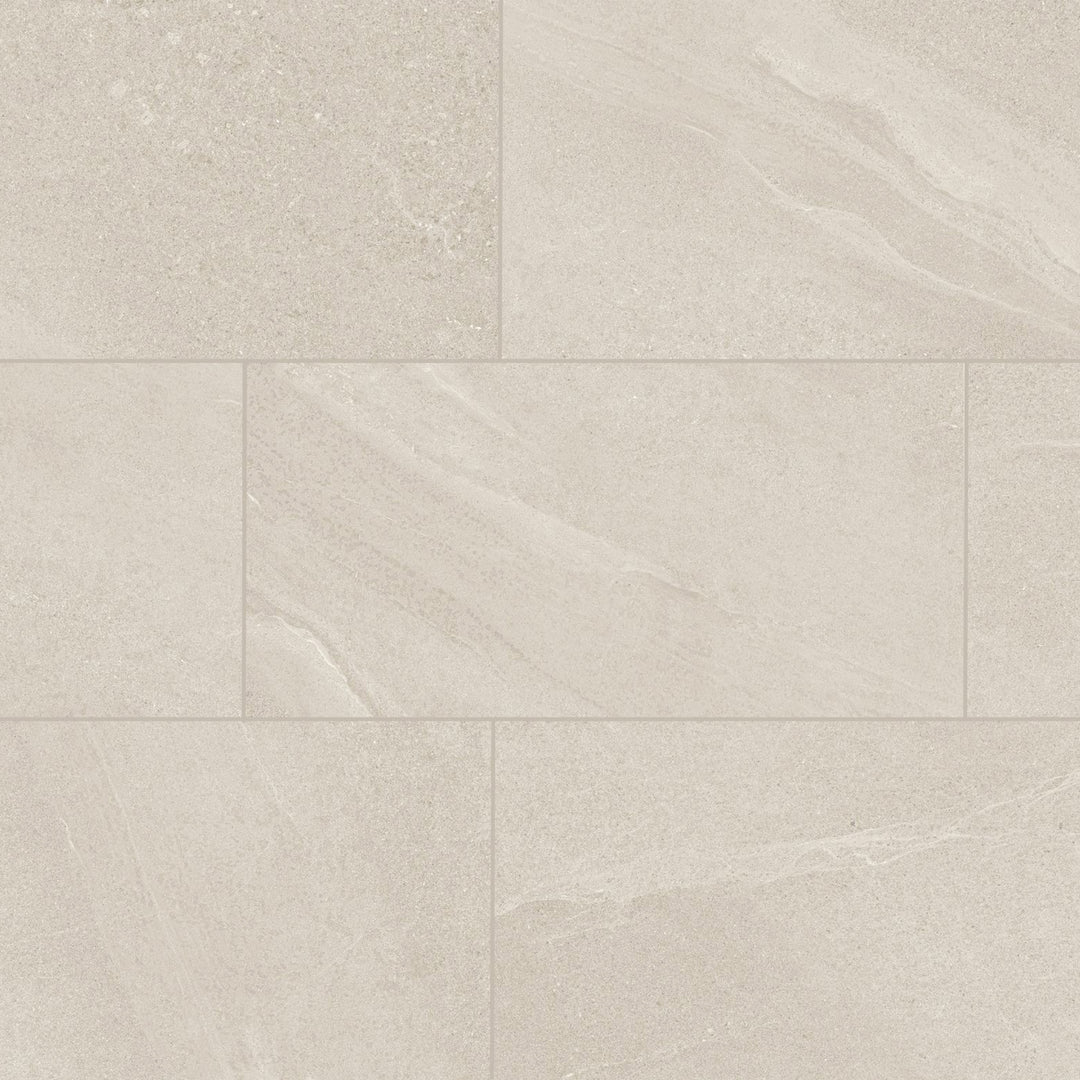 Bird's eye view showcasing the ivory boston tile, sized 11.8x23.6, with a textured coating that enhances its warm hue.