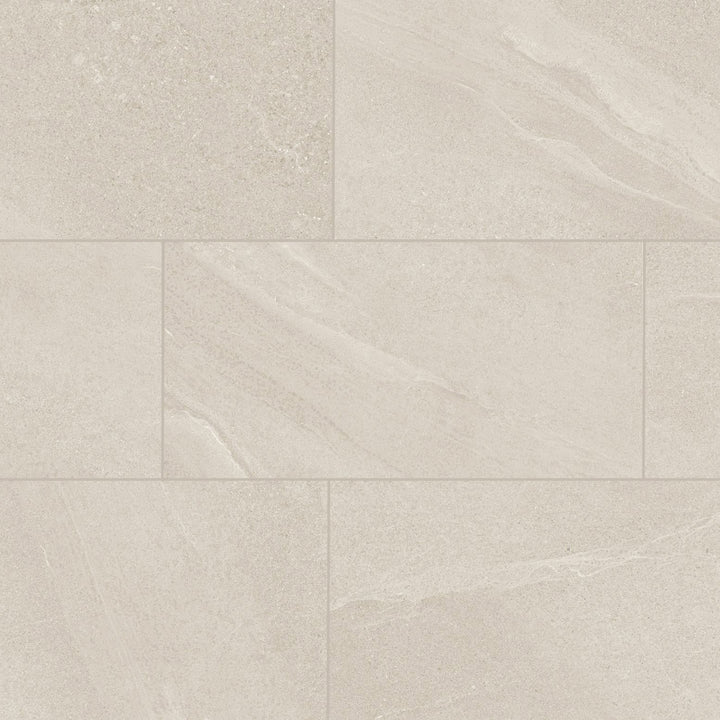 Bird's eye view showcasing the ivory boston tile, sized 11.8x23.6, with a textured coating that enhances its warm hue.