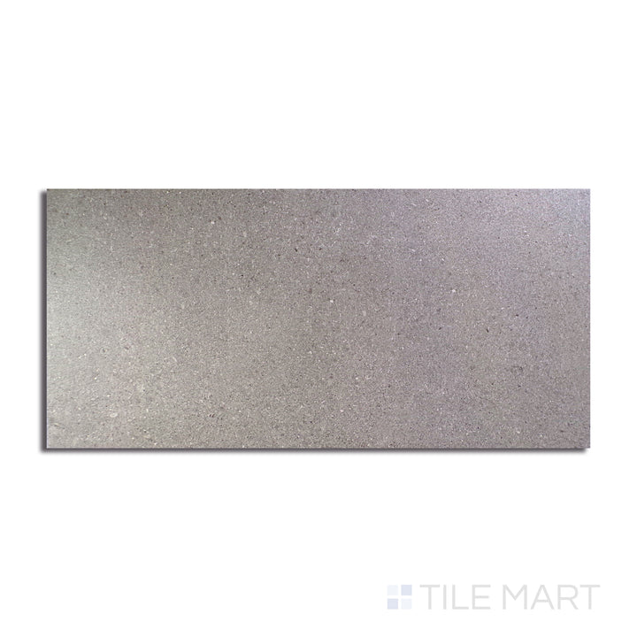 An angled look at the gray boston tile, highlighting its smooth glaze and the boldness of its deep shade.