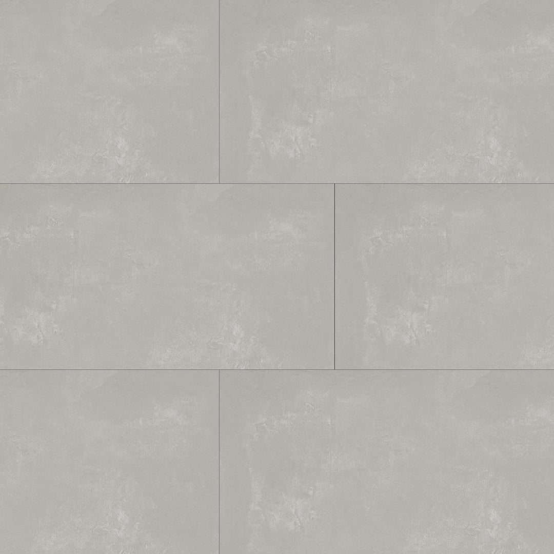 Top angle showcasing the gray essential tile, sized 12x24, with a reflective sheen that enhances its soft undertone.