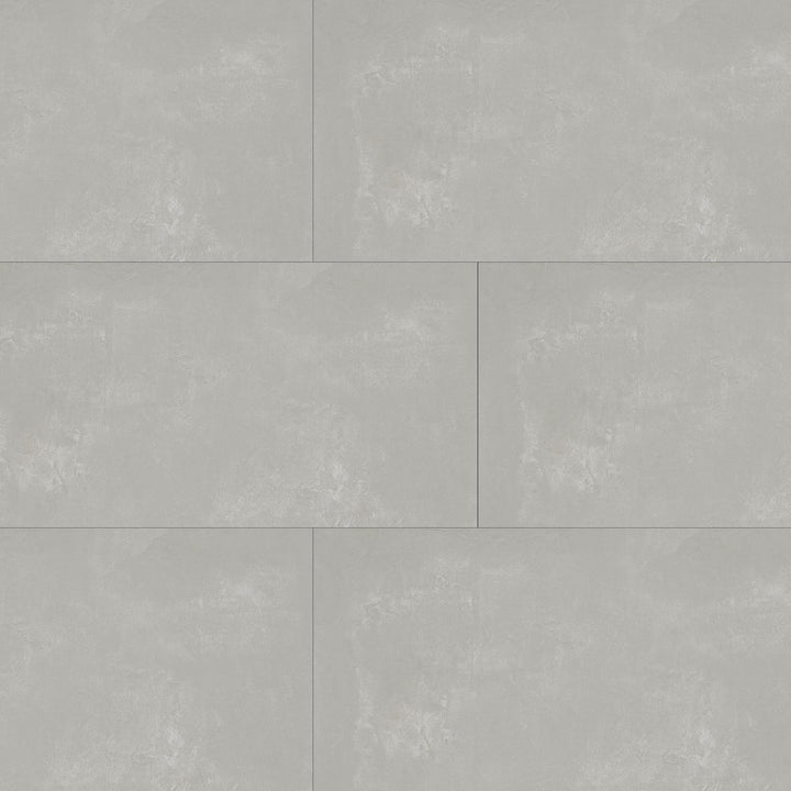 Top angle showcasing the gray essential tile, sized 12x24, with a reflective sheen that enhances its soft undertone.