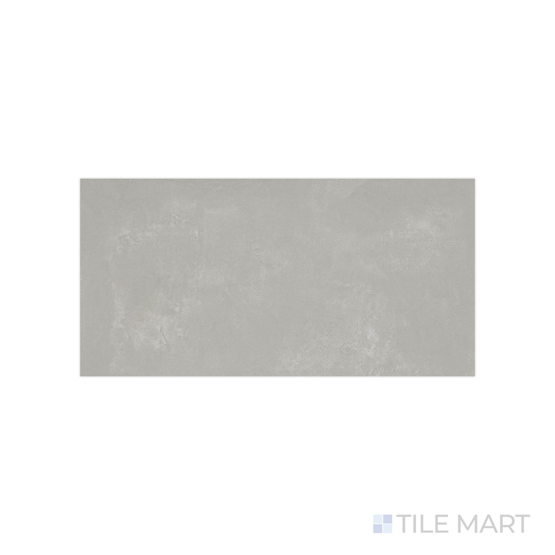 An angled look at the gray essential tile, highlighting its textured coating and the boldness of its deep shade.