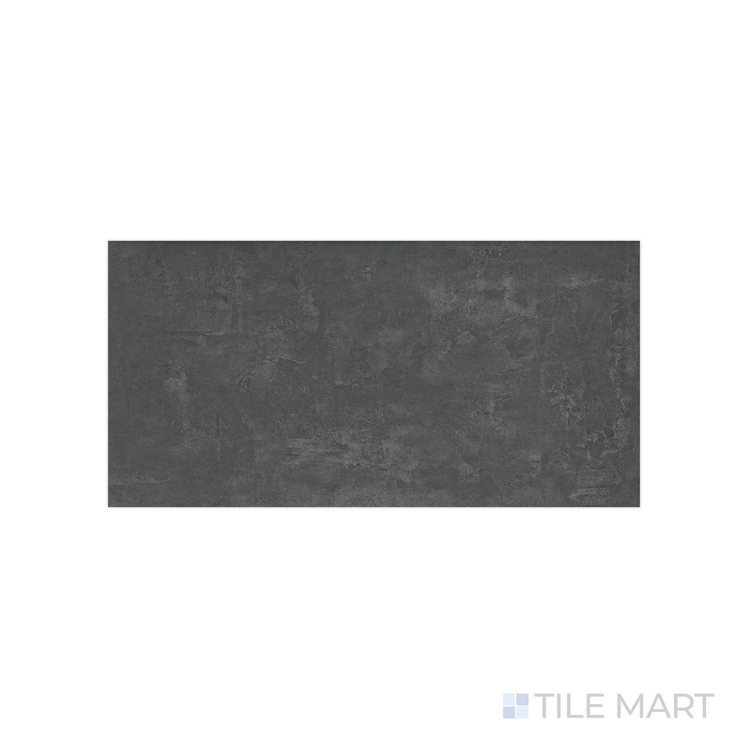 An angled look at the graphite essential tile, highlighting its reflective sheen and the boldness of its rich pigment.