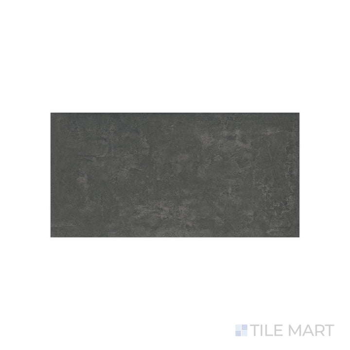 An angled look at the graphite essential tile, highlighting its reflective sheen and the boldness of its rich pigment.