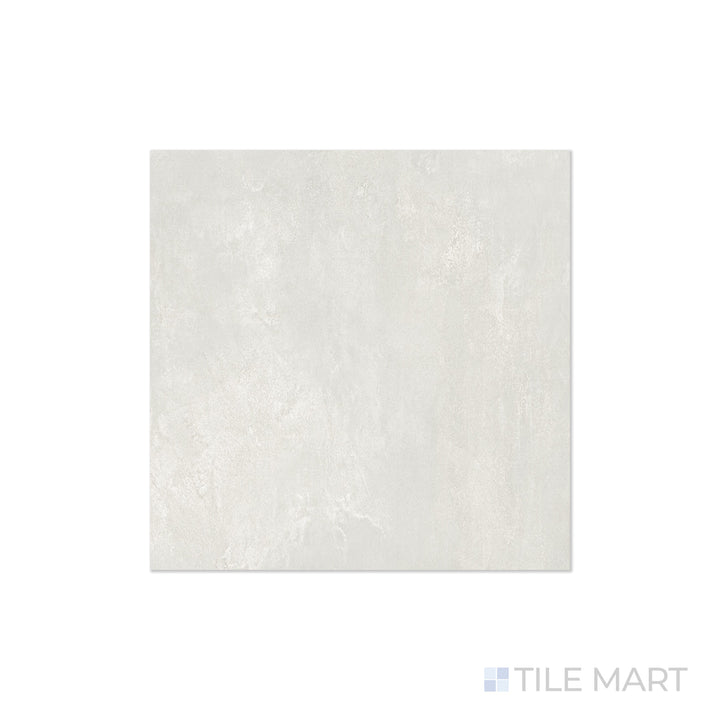 An angled look at the white essential tile, highlighting its matte surface and the boldness of its warm hue.