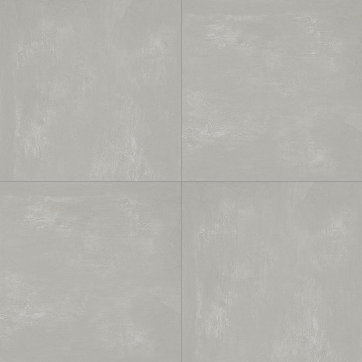 Aerial shot showcasing the gray essential tile, sized 24x24, with a reflective sheen that enhances its vivid tint.