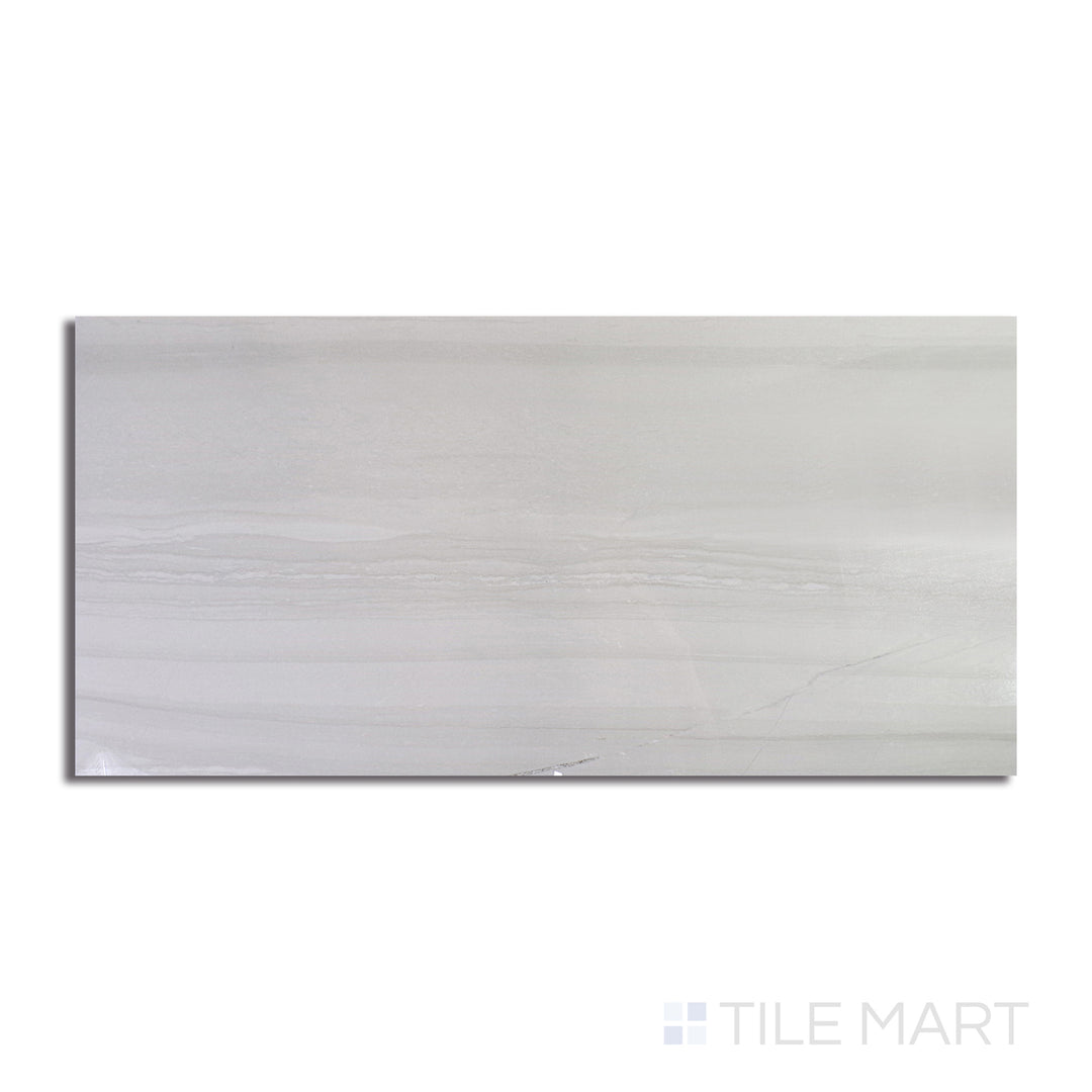 An angled look at the bianco demira tile, highlighting its smooth glaze and the boldness of its vivid tint.