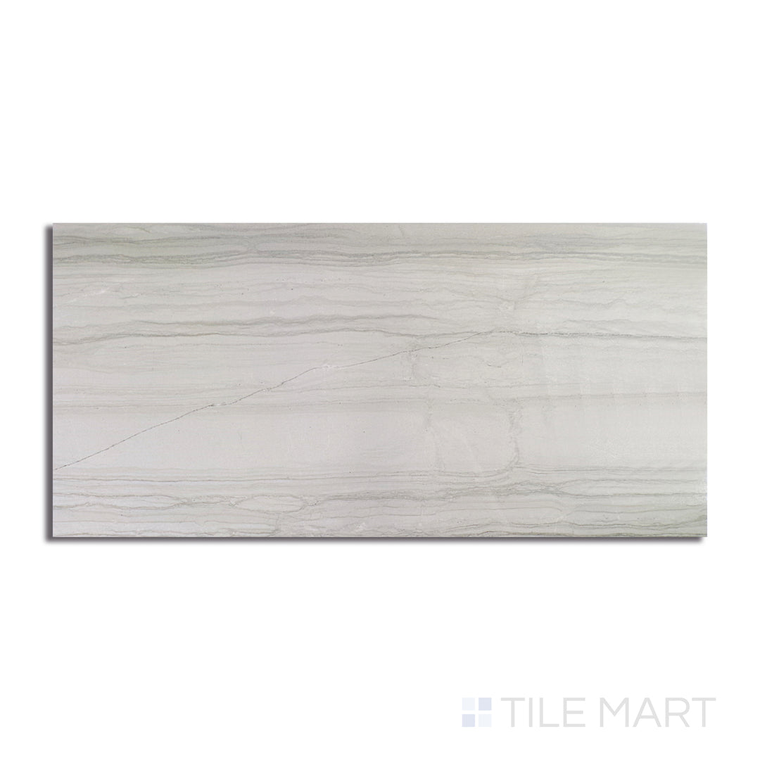 An angled look at the light grey demira tile, highlighting its reflective sheen and the boldness of its deep shade.