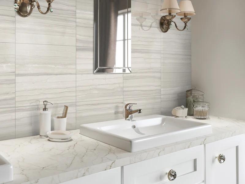 A lifestyle setting, featuring light grey demira tile with a polished texture, adding a modern touch to the space.