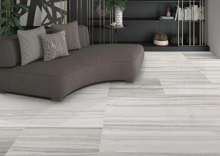 A polished porcelain tile with a refined light grey tone, Demira Light Grey 12x24 adds brightness and elegance.
