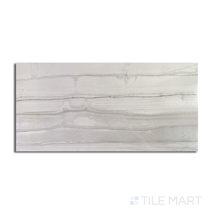 An angled look at the dark grey demira tile, highlighting its smooth glaze and the boldness of its vivid tint.