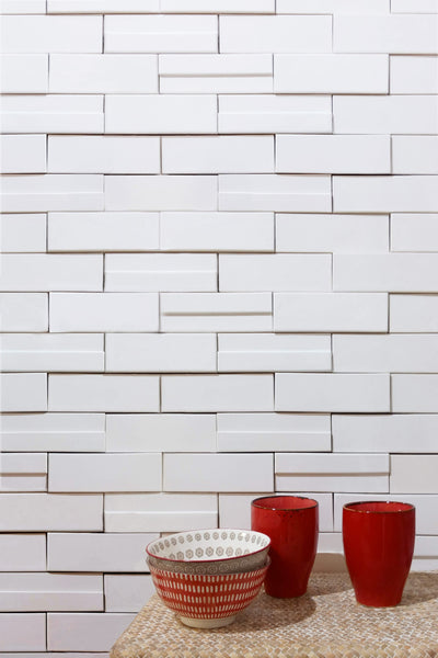 Casablanca Cloud 2x6 glossy ceramic subway extruded tile conveying a soft cloud-white character with its classic subway format and light-catching glossy finish